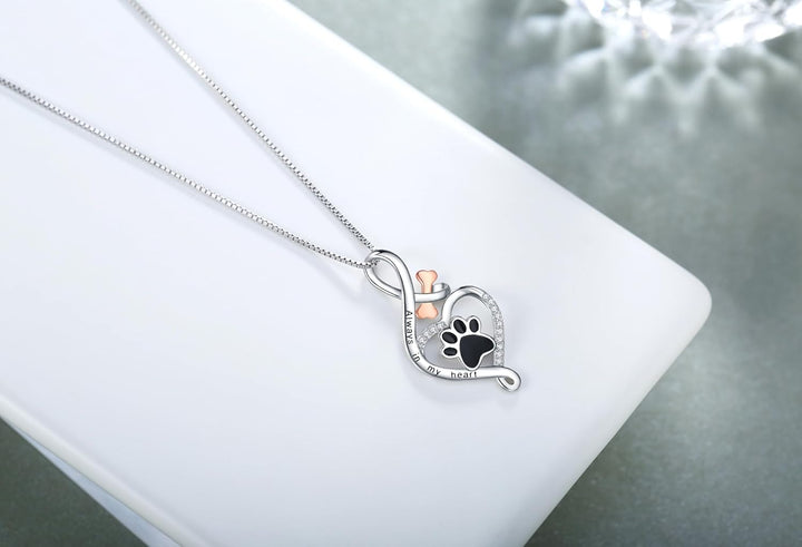 Collana Lucky Paw con cuore, osso e simbolo dell'infinito