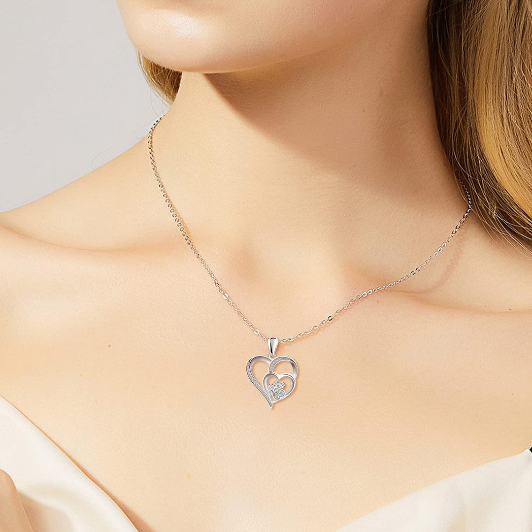 Collana in argento sterling con zampa e cuore con zirconi