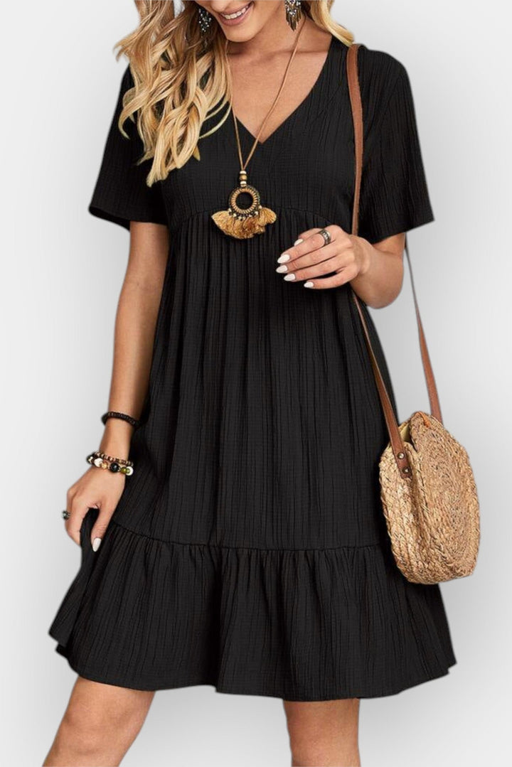 Kostkované šaty s V výstřihem