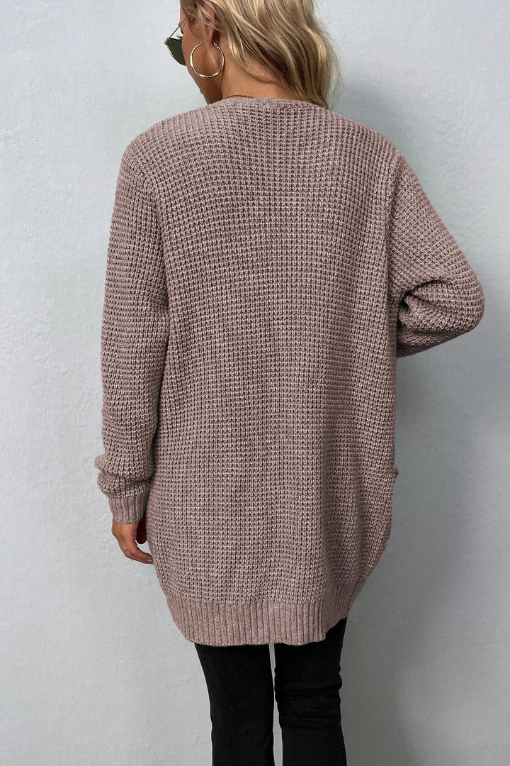 Růžový otevřený svetr