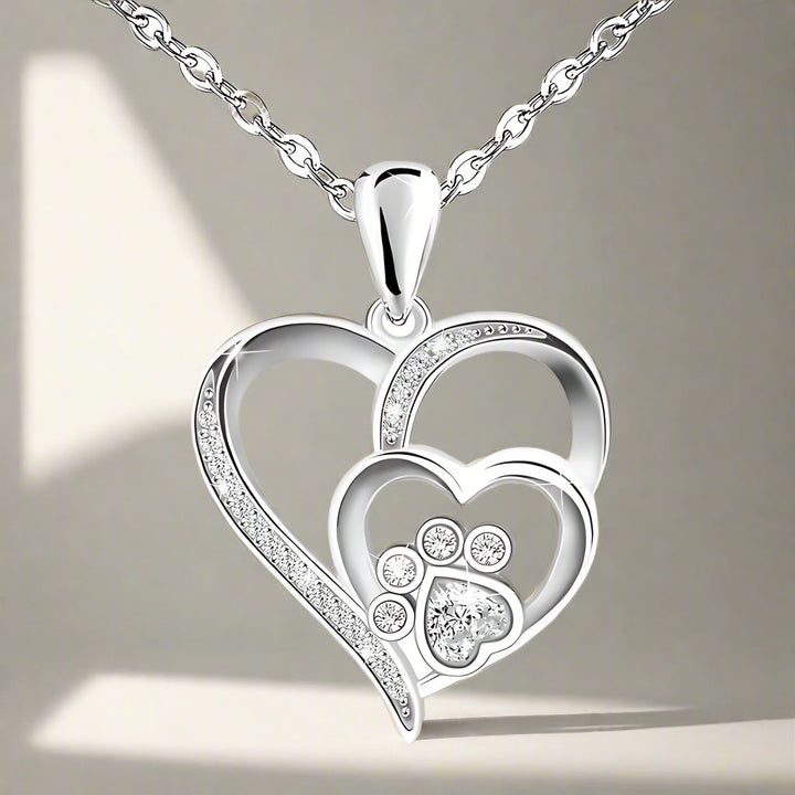 Collana in argento sterling con zampa e cuore con zirconi